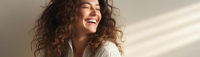 Happy woman, neutral studio setting, natural pose, bright ambiance, right margin for copy photo