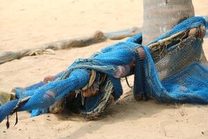 close up of a fishing net aroud a pole photo