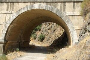 roman aqueduct in province Malaga, Spain photo