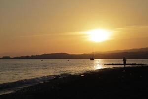 sunset at the beach photo