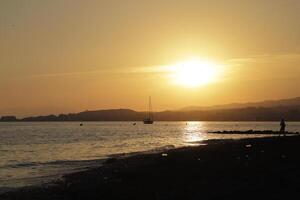 sunset at the beach photo
