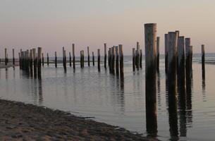 sunset in the pole village of Petten in the Netherlands photo