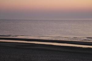 sunset at the beach photo
