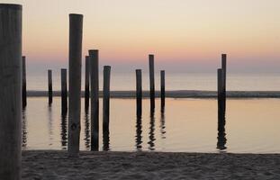 sunset in the pole village of Petten in the Netherlands photo