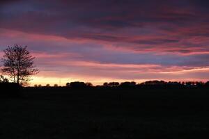 colorful sunset in the netherlands photo