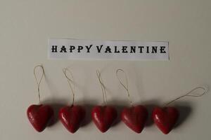 red hearts on a white background photo