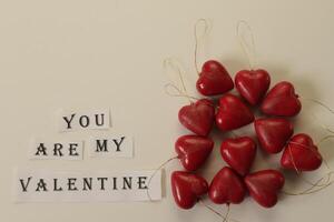 red hearts on a white background photo