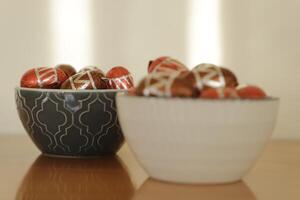 bowl with chocolate easter eggs photo