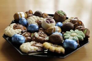 easter chocolate eggs colorful wrapped in foil photo