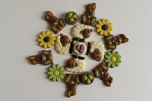 chocolate easter flowers, bunnies, lamb and eggs photo