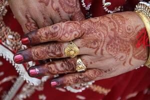 henna or mehndi tattoos on hands photo