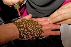 henna or mehndi tattoos on hands photo