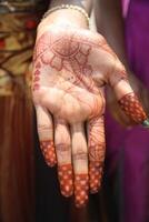 henna or mehndi tattoos on hands photo