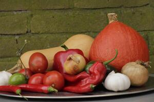 a plate with Fresh vegetables picked fresh from the garden photo