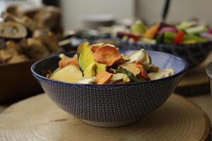 a bowl with crispy baked vegetables, healthy lifestyle photo