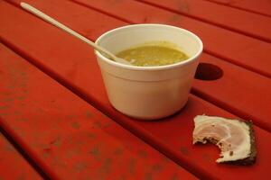 Dutch pea soup with bread and bacon photo