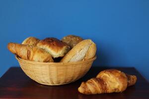 basket with breakfast sandwiches photo