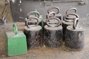 antique weights to weigh cheese photo