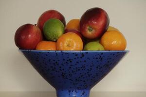 a bowl with mixed fruit photo