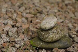 piled pebbles on stones photo