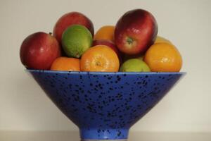 a bowl with mixed fruit photo