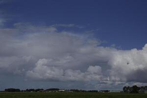 dramatic grey colors, sky with clouds photo