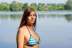 bikini girl at lake photo