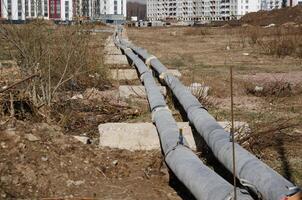 Pipes are laid in the construction of houses photo