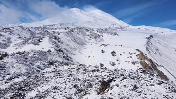 Aerial view of the northern slopes of Mount Elbrus in sunny weather video