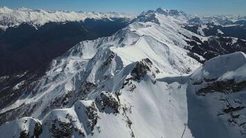 Aerial. majestic snow-capped mountain ranges in Krasnaya Polyana video