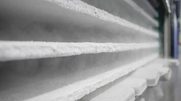 Slow motion. Freezer steam drips down frosty packages video