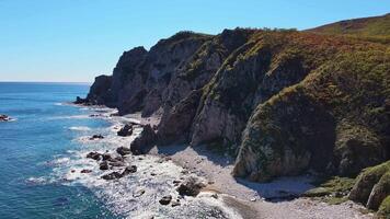 Majesty of nature shines Sea of Japan surrounded by cliffs Majesty of nature home diverse oceanic life. Majesty of nature enriching forest view Cliffs and waters symphony natural splendor resonates. video