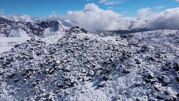 Volcanic slopes of Elbrus are covered with snow in summer video