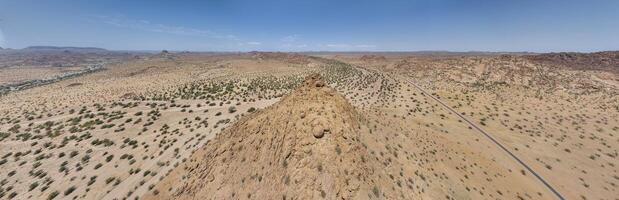 Drone panorama over the Namibian desert landscape near Twyfelfontein during the day photo