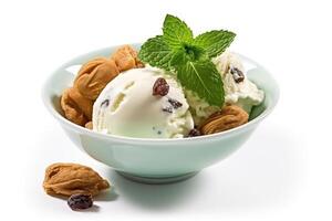 Vanilla ice cream raisins and mint in bowl isolated on white background.. photo