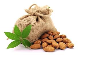 Almonds in the bag isolated on white background.. photo