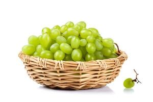 Green grape in wicker basket isolated on white background.. photo