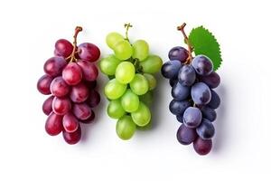 Mix of grapes with leaves isolated on the white background.. photo