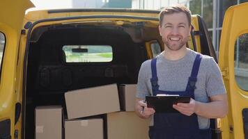 Courier with clipboard near delivery van outdoors video