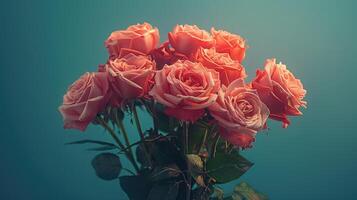 Bouquet of pink roses with a vintage filter effect, isolated on a teal background. photo