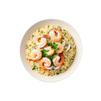 Seafood risotto a creamy Italian rice dish with shrimp scallops and clams garnished with fresh png