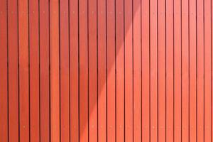 Wooden stripes Concrete Tile sun shading Fence Wall Background with sunlight and shadow on surface photo