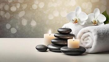 Spa ambience with stones candles and towels photo