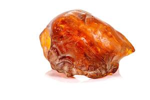 Macro stone amber mineral on white background photo