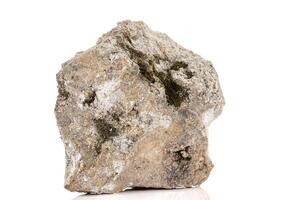 Macro of a mineral stone Vesuvianite on a white background photo