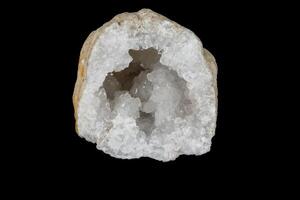 Macro mineral stone Quartz geode black background photo
