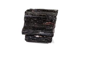 macro mineral stone schorl, black tourmaline on white background photo