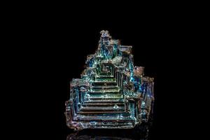 Macro of the stone bismuth mineral on a black background photo