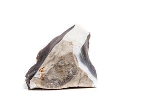 Macro mineral stone Flint in the rock on a white background photo