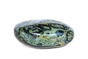 Macro mineral stone jasper kambaba on a white background photo